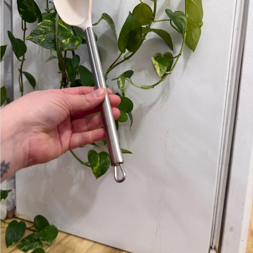 Elegant Silver and White Kitchen Spoon
